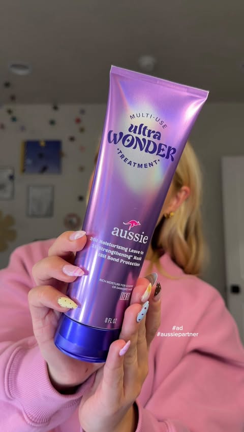 Instagram post by @savannahhurd_ for Aussie Hair. Caption reads: [...] in HALF?? yes please Ultra Wonder!....