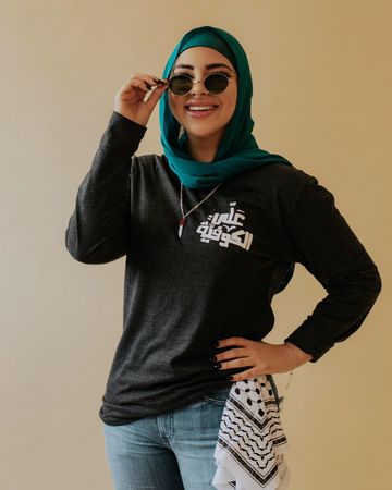 Instagram post by @ninakharoufeh for PaliRoots. Caption reads: This #BlackFriday @paliroots is planning to donate....