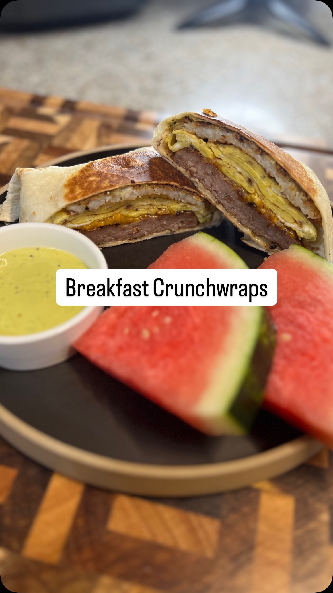 Instagram post by @ithinkican_cook for Premio Foods. Caption reads: Sausgae Egg & Cheese Crunchwraps with @premiofoods....