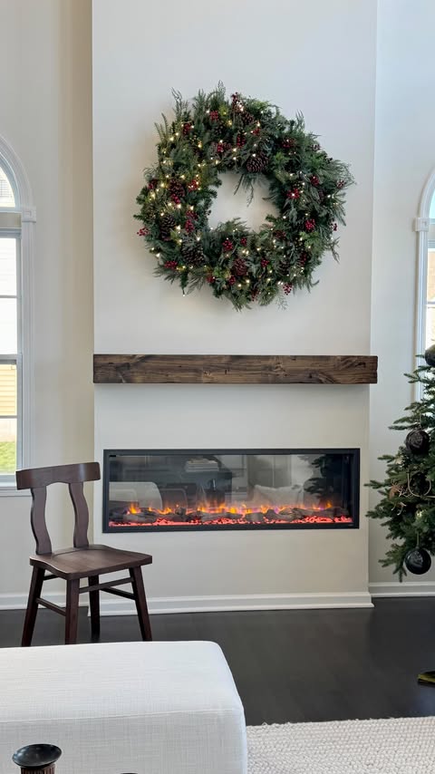 Instagram post by @karen_homestyle for Balsam Hill. Caption reads: Love this stunning oversized wreath over my mantel....