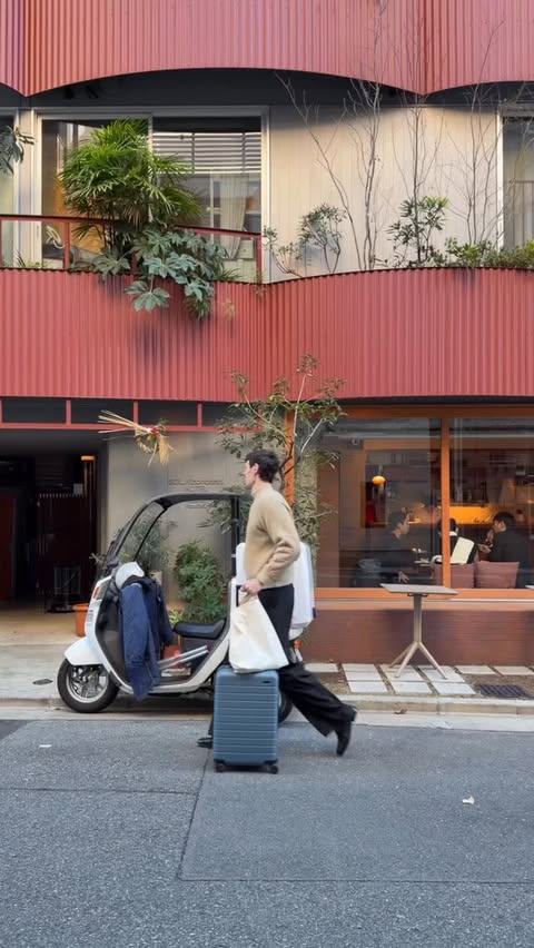 Instagram post by @drewfromladue for Away. Caption reads: #awaypartner let’s pack for japan! packing all....