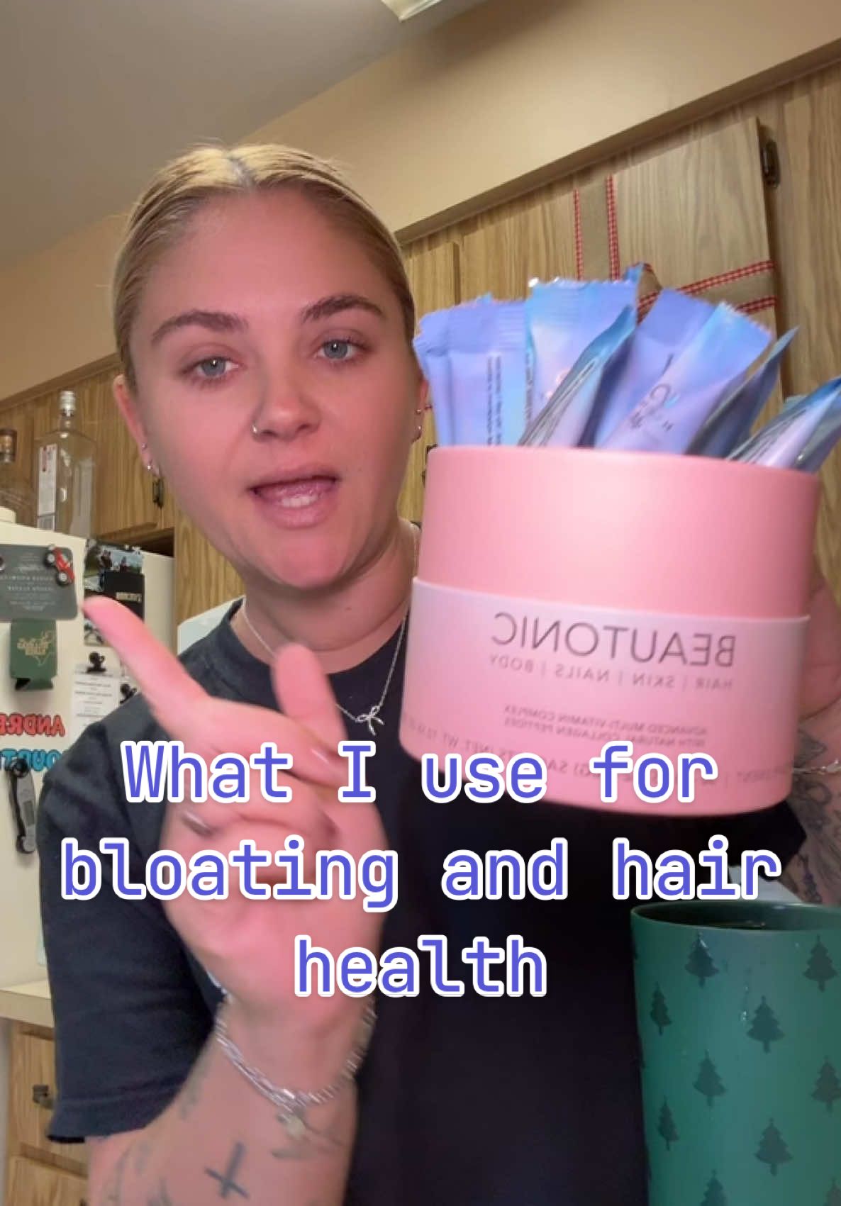 TikTok post by @kortni_cutaia for Hairfinity. Caption reads: [...] stuff is so good! #collagen #drinkmix....