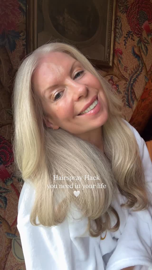 Instagram post by @goodlifecarrie for Emi Jay. Caption reads: How to get rid of hair flyaways… 🤍especially on....