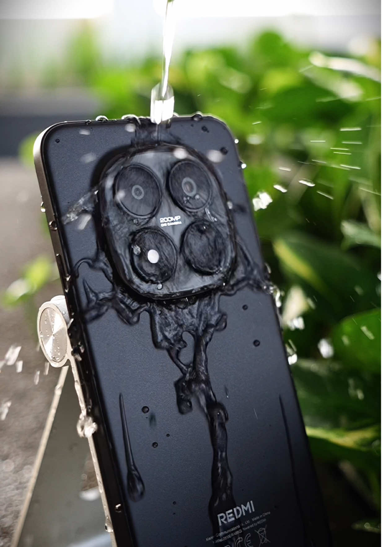 TikTok post by @eizuwan for Xiaomi. Caption reads: [...] dan body yang sangat tahan lasak ! @Xiaomi....