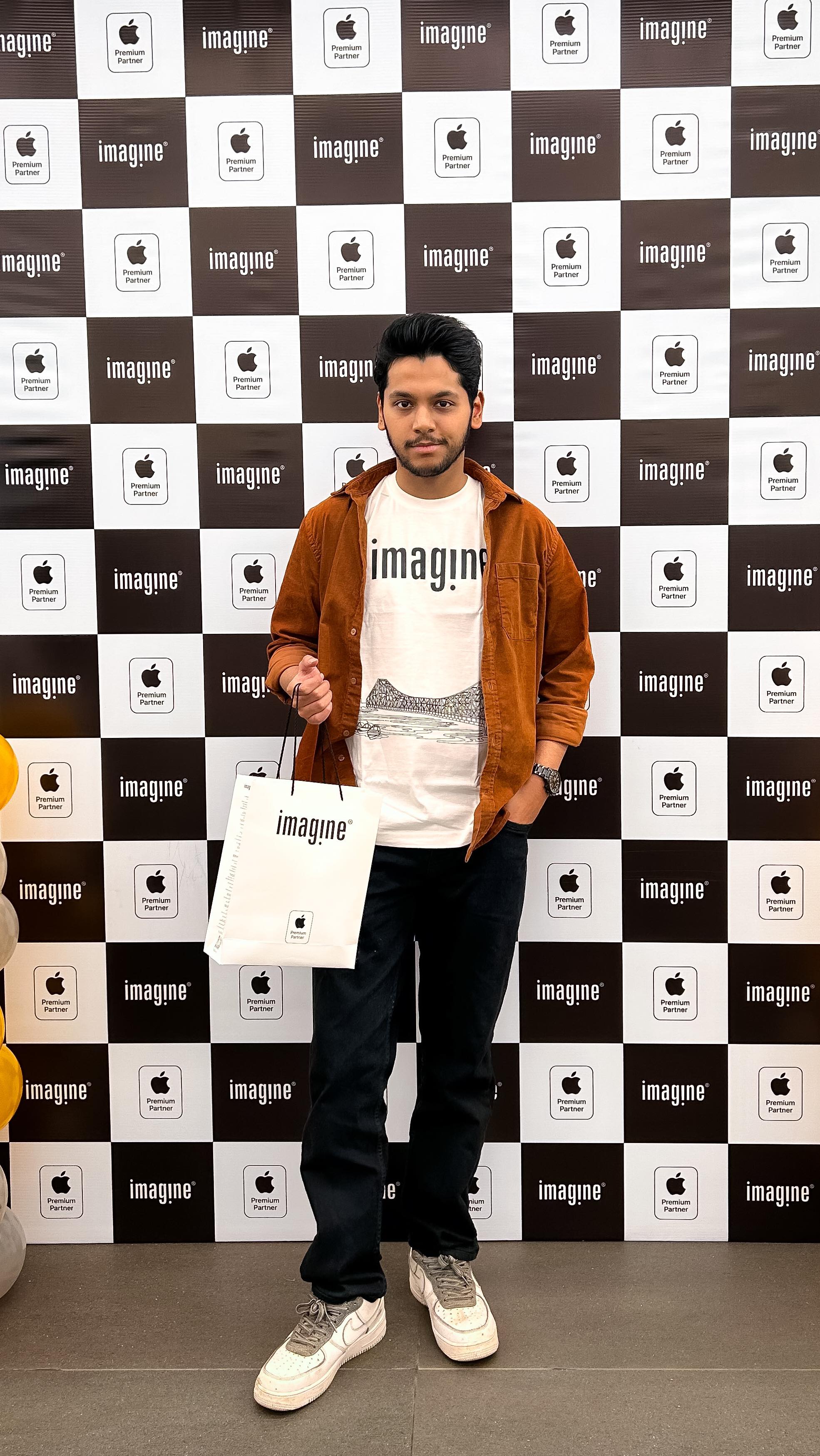 Instagram post by @karmakar_rishav for Imagine Apple Premium Partner. Caption reads: A grand celebration of International Women’s Day....
