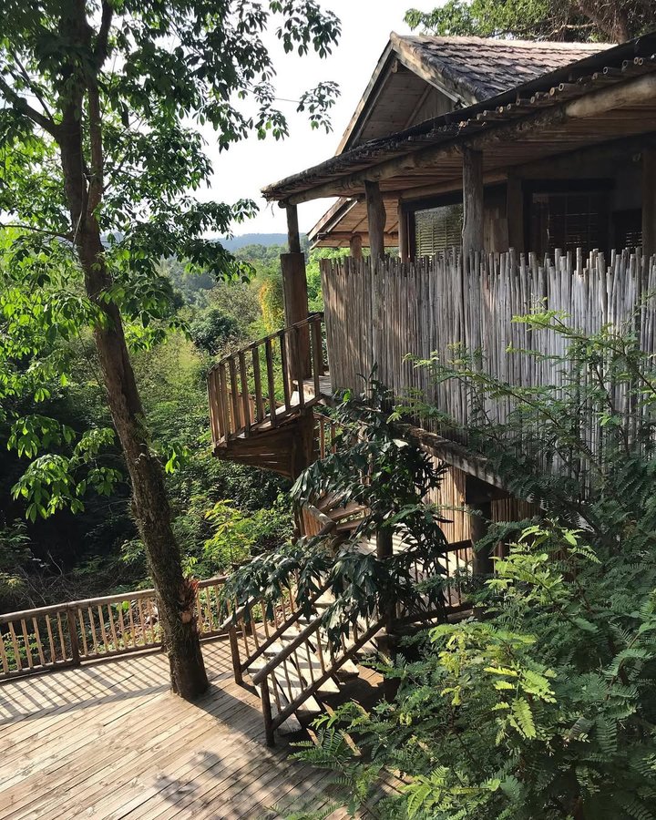 Instagram post by @travelingwithstyle_ for Small Luxury Hotels. Caption reads: Nature + Eco Design + Wellness = #sonevakiri....