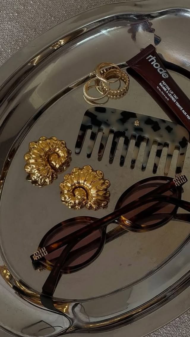 Instagram post by @inna__ugc for TOZOSTORE. Caption reads: @tozo_official Product link: • #tozo #tozoearbuds....