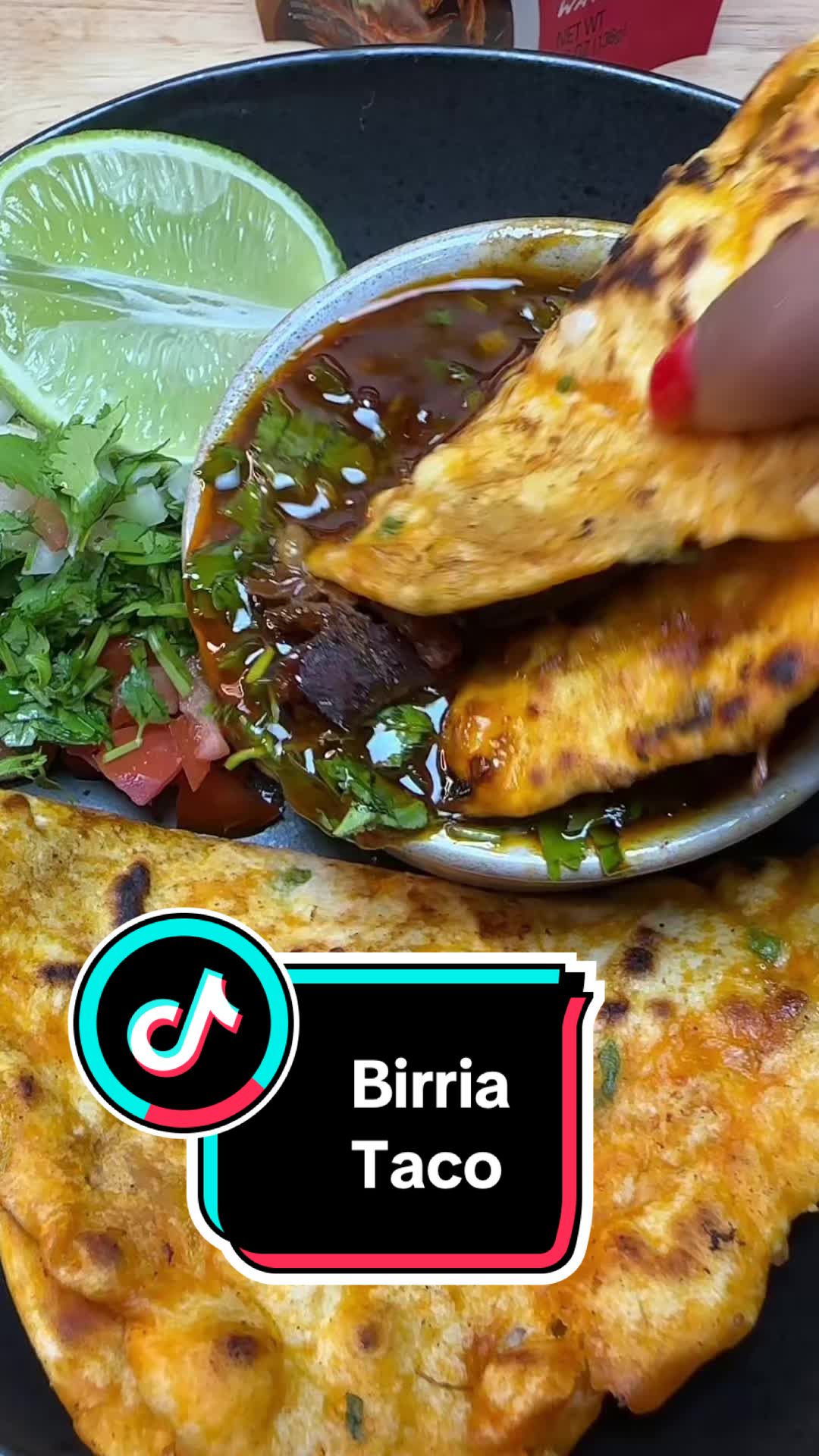 TikTok post by @deeopt6 for EZ Bombs. Caption reads: #birriabombs #birriataco #foodie #jamaicantiktok....