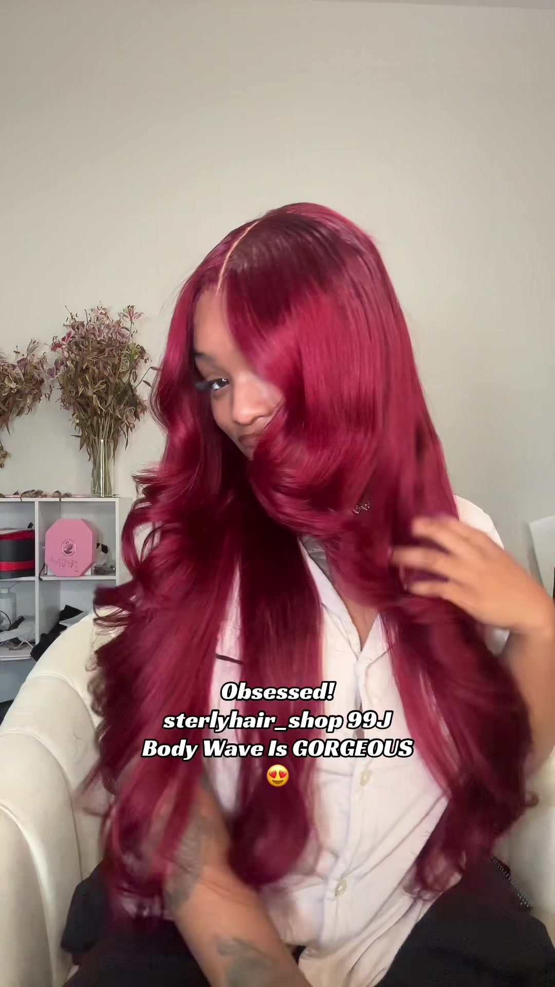 TikTok post by @wh0.nia for Sterly Hair. Caption reads: @sterlyhair 🤎🎀.