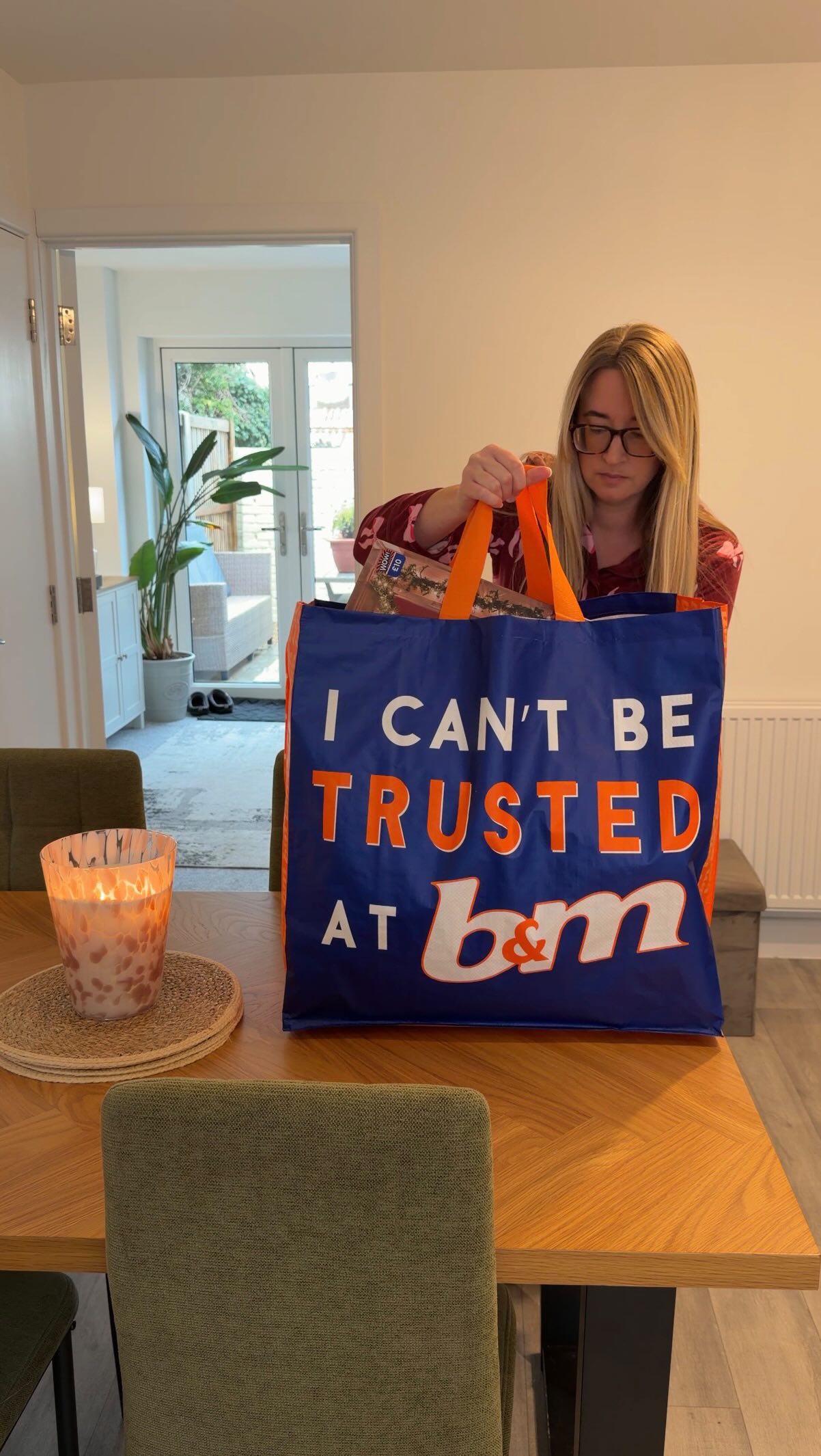 Instagram post by @loushomelife for B&M Stores. Caption reads: Picked up my first Christmas bits for the new....