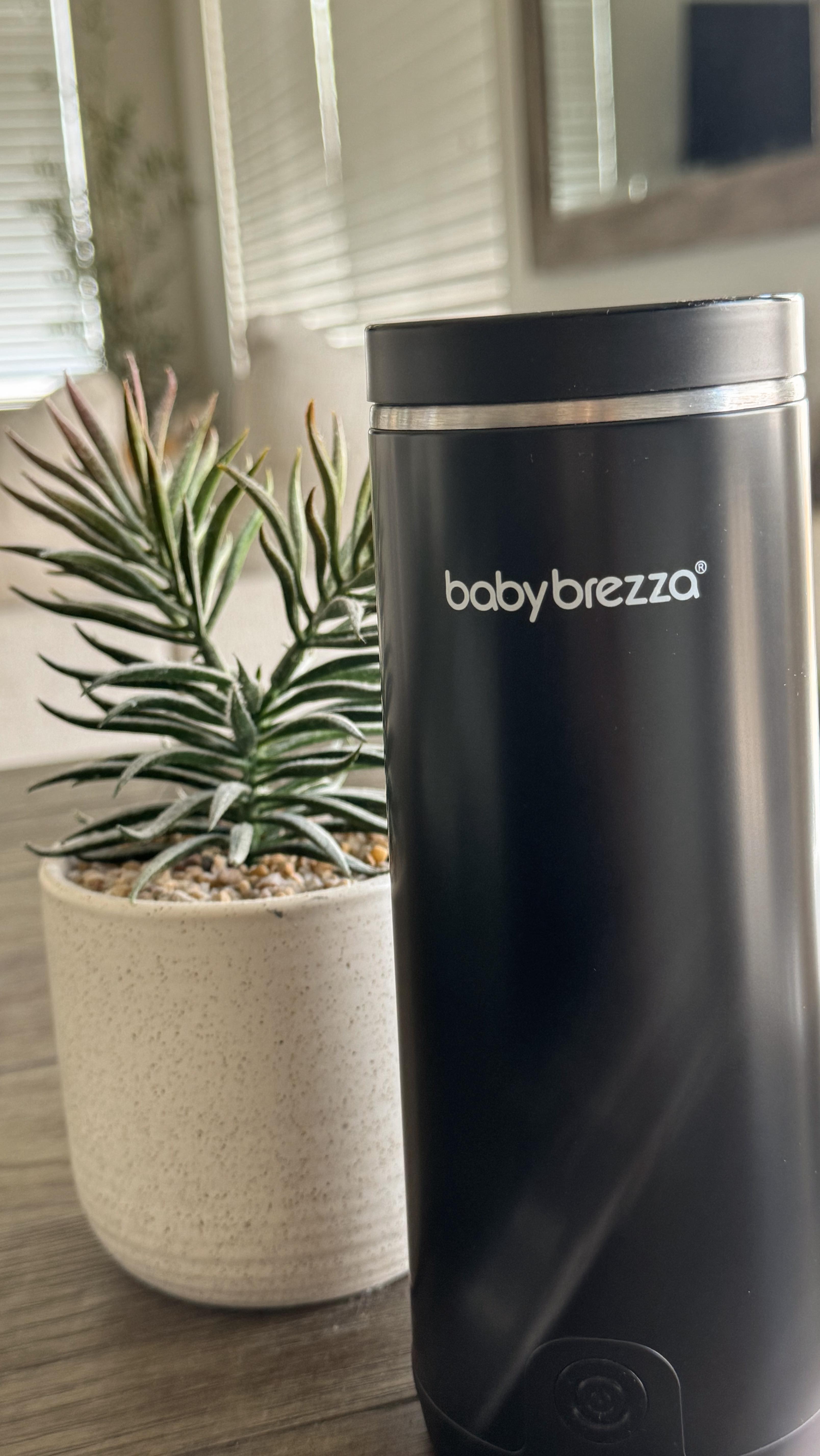 Instagram post by @michlennbocoboc for Baby Brezza. Caption reads: [...] with baby? No problem! The @babybrezza....