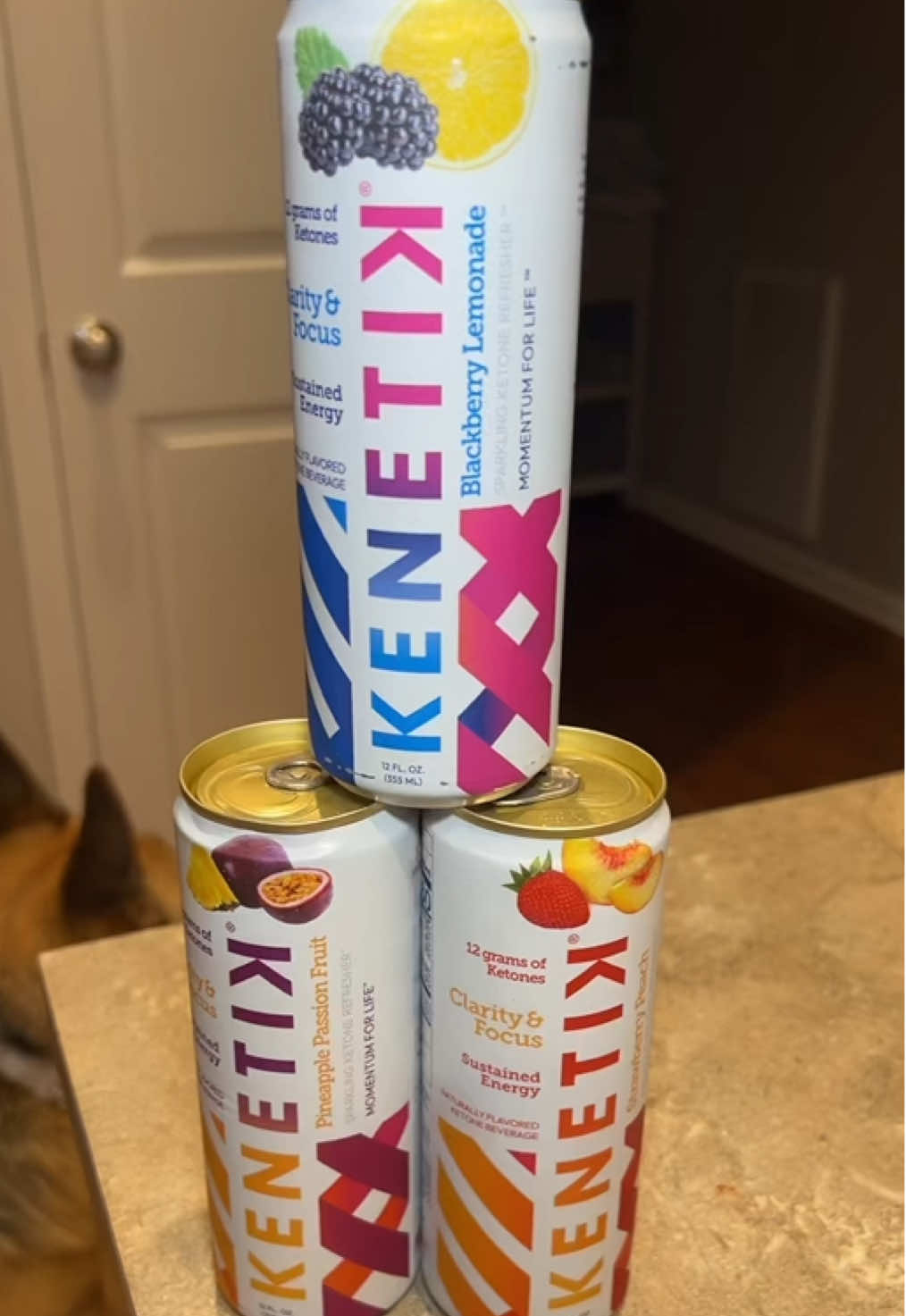 TikTok post by @trishbru for Kenetik. Caption reads: ⚡ Natural energy + no crash! @Kenetik #ketolife....