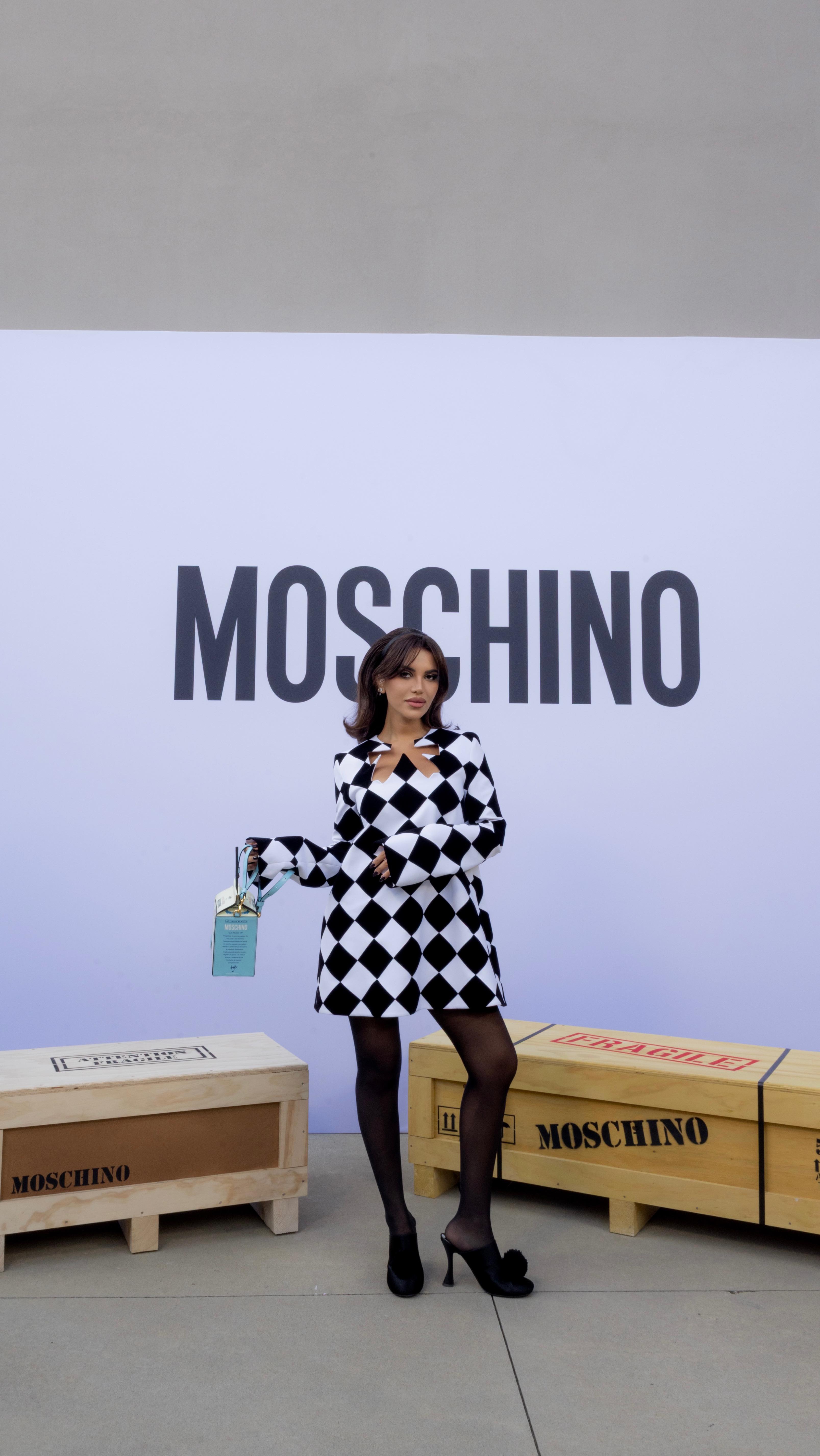 Instagram post by @nojoud_alrumaihi for Moschino. Caption reads: Straight out of a @moschino movie 🍿🎬
#moschino.