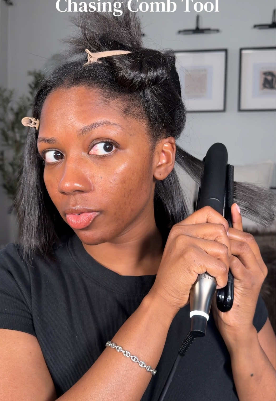 TikTok post by @niaraalexis_ for Farouk Systems. Caption reads: Replying to @Mikayla using @ghd USA Chronos....