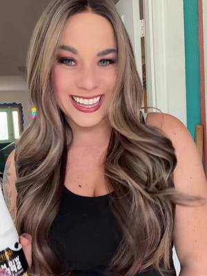 TikTok post by @elizabethwearswigs for Valer Boutique. Caption reads: New wig milk spray in from @Valer Boutique #wigs....