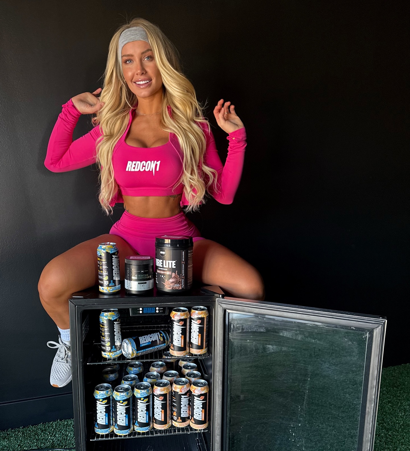 Instagram post by @lexytaylorbikinibody for REDCON1. Caption reads: Ya thirsty !?💧 @redcon1 can fix that 🫶.