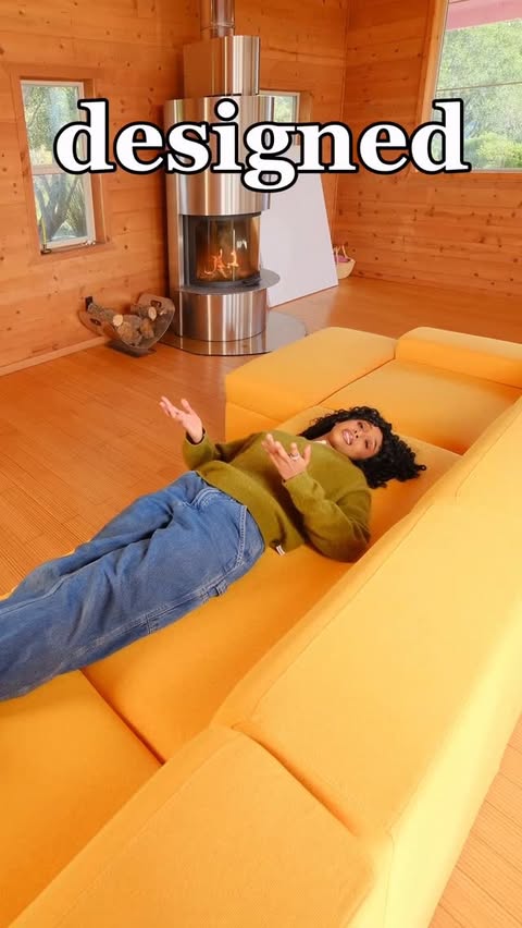 Instagram post by @jennelle.eliana for Cozey. Caption reads: Yay! new couch! 💛🛋️ @cozey #CozeyPartner #ad.