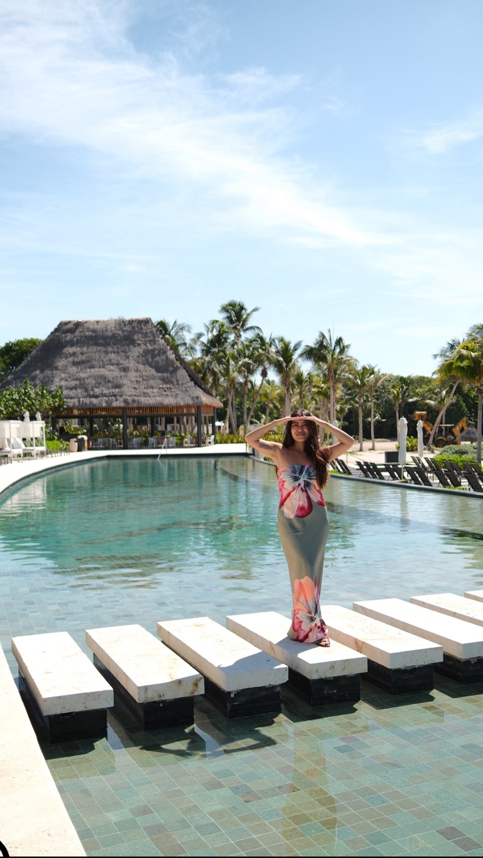 Instagram post by @finding.jules for Travel + Leisure. Caption reads: There’s a rhythm here at Conrad Tulum Riviera Maya....