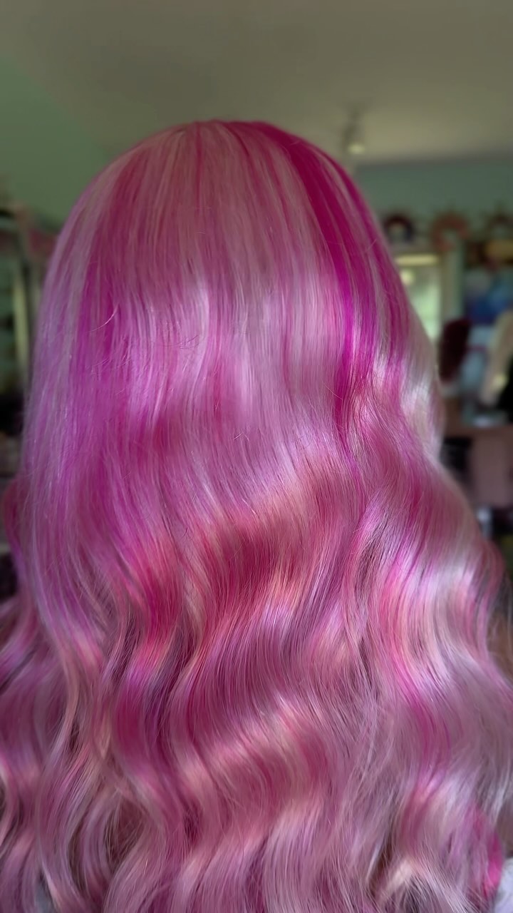 Instagram post by @hairbylunabelle for OVERTONECOLOR. Caption reads: Pink hair is everything 🩷🎀

Color @overtonecolor....