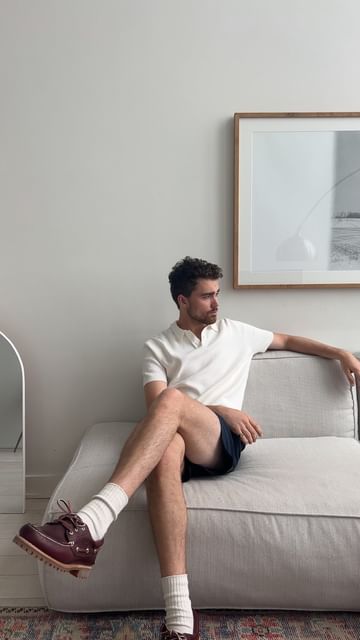 Instagram post by @ethantglenn for The Bay. Caption reads: A knit polo and nylon shorts are 2 of my go to....