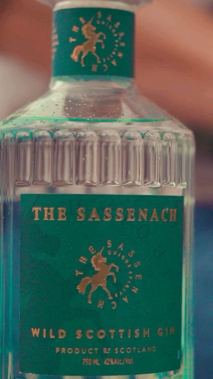 Instagram post by @outlander__forever for Sassenach Spirits. Caption reads: [...] of premium spirits. Join the....