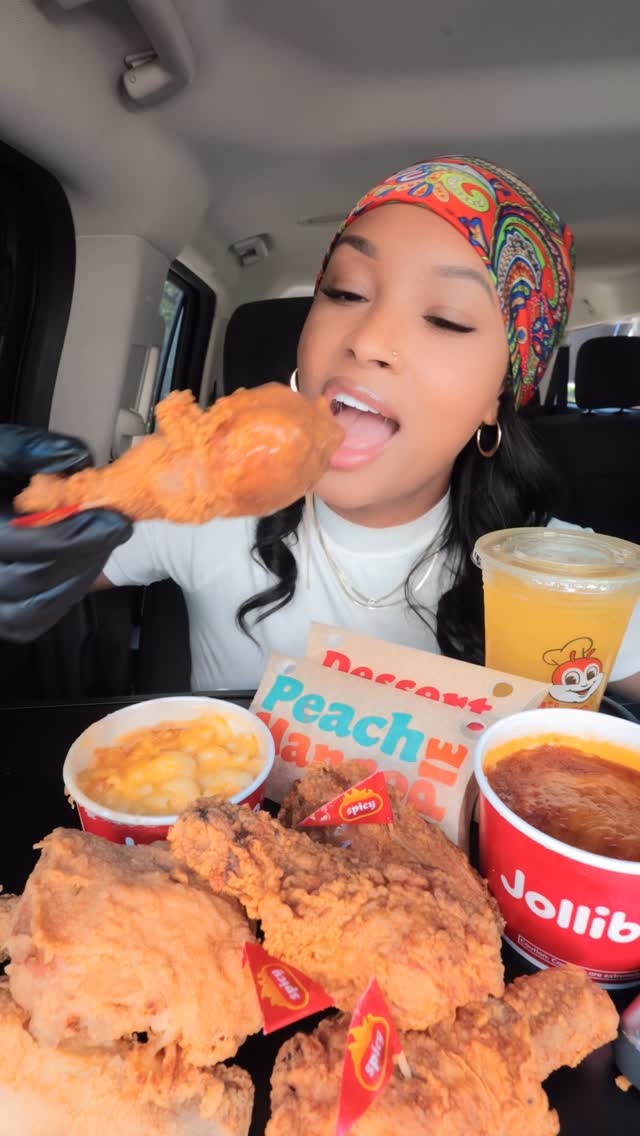 Instagram post by @officialqueenbeast for Jollibee US. Caption reads: #ad No better way to have a jolly day than to have....