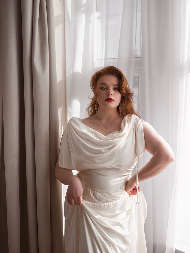 Instagram post by @missdeadlyred for LaceMade. Caption reads: [...] actual goddess in this dress ✨ Dress-....