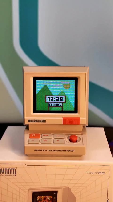 Instagram post by @ertiqua for Divoom. Caption reads: [...] is a gamer or just loves retro vibe 😮....
