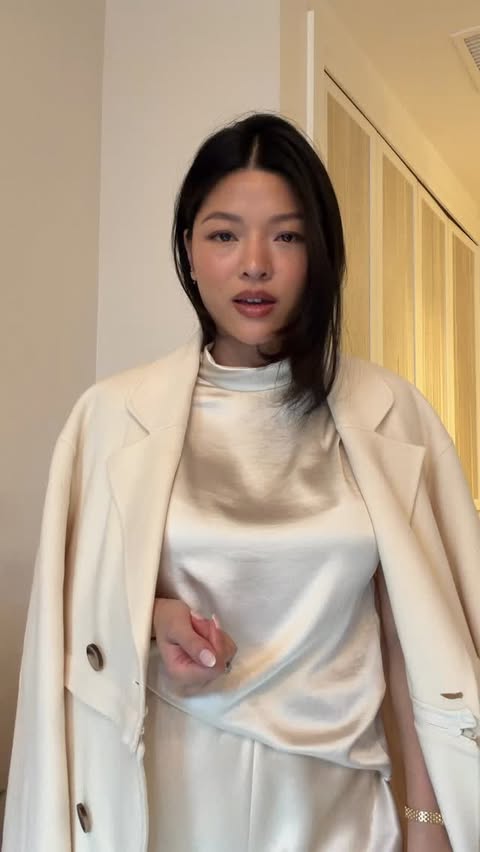 Instagram post by @charlenetruong for Donna Karan. Caption reads: [...] my clothes, I layer my fragrances....