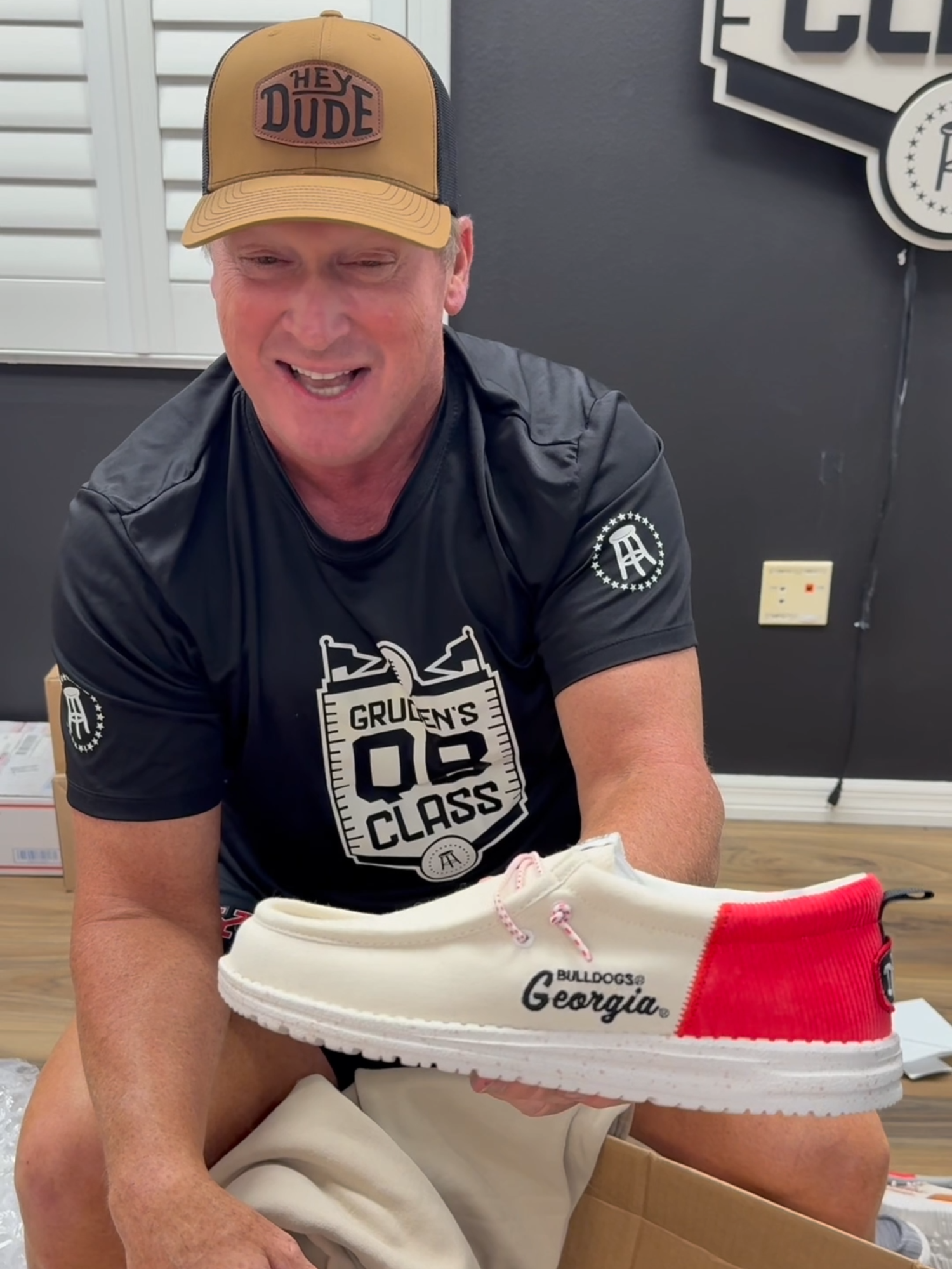 TikTok post by @barstoolgruden for HEYDUDE. Caption reads: This box is unbelievable and it comes from my....