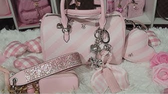 YouTube post by @misstoya8005 for Rose Forever. Caption reads: What's In My Victoria's Secret Mini Duffle 💕.