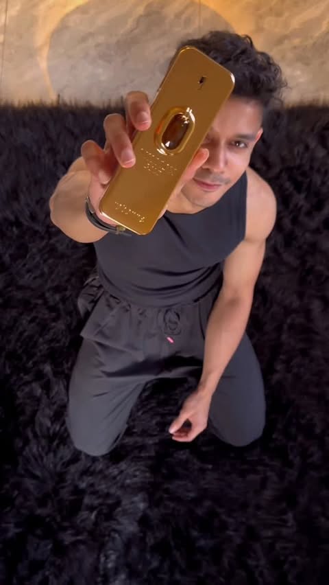 Instagram post by @_tazwar._ for rabanne. Caption reads: [...] it’s an aura. Million Gold Elixir by....