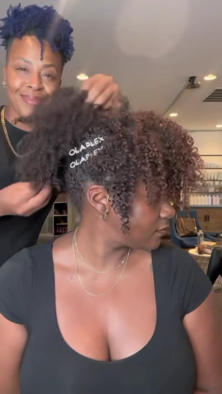 Instagram post by @curlfactor for OLAPLEX. Caption reads: In the chair with @curlfactor 

Bring your curls....