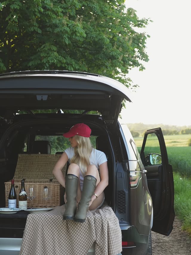 Instagram post by @hannahrosieadkins for Land Rover. Caption reads: summer evenings with @landroverdiscovery &....
