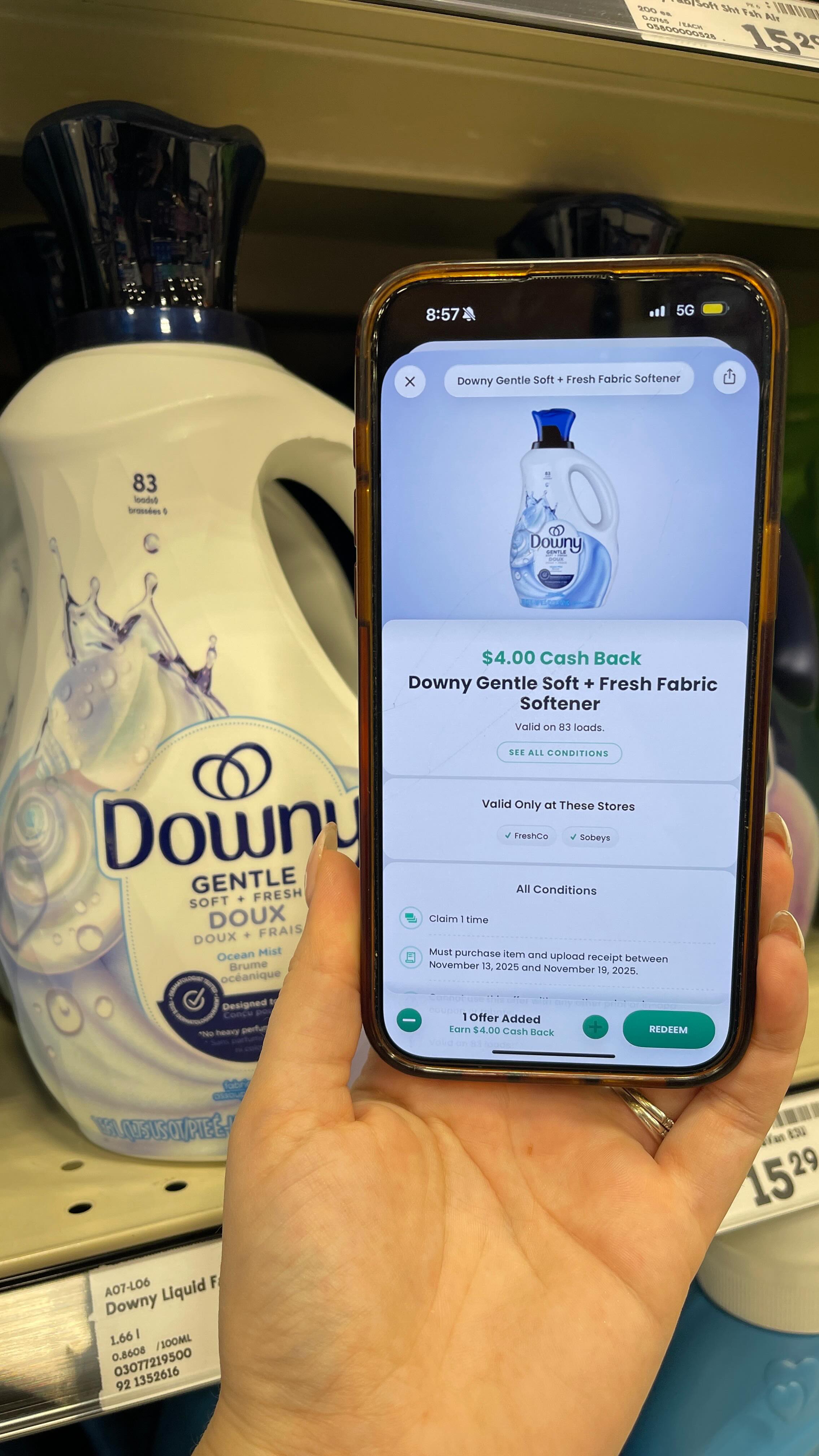 Instagram post by @livingonaloonie for downy. Caption reads: #ad | Save $4 on the new Downy Gentle Soft +....