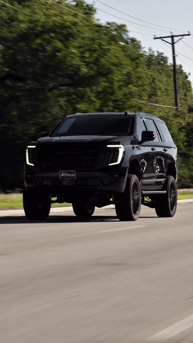 Instagram post by @autoplexcustoms for GMC. Caption reads: 2025 GMC YUKON ELEVATION

144 MILES / STOCK....