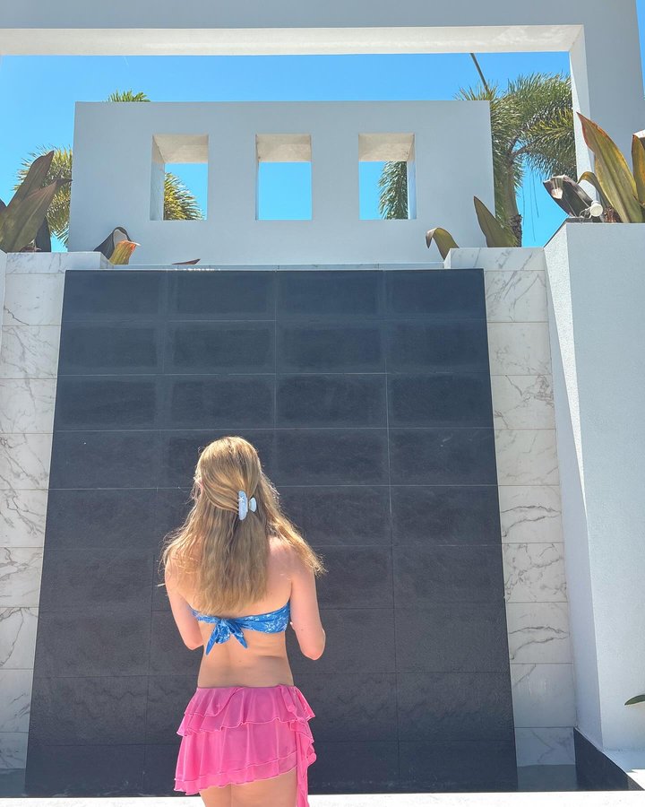 Instagram post by @pipercrawford6 for Kulani Kinis. Caption reads: [...] Barbie 🩷😙 outfit details: top:....