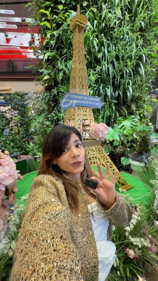 Instagram post by @radhika_nomllers for iShopChangi. Caption reads: Ready to Win the Ultimate Luxury Escape?....