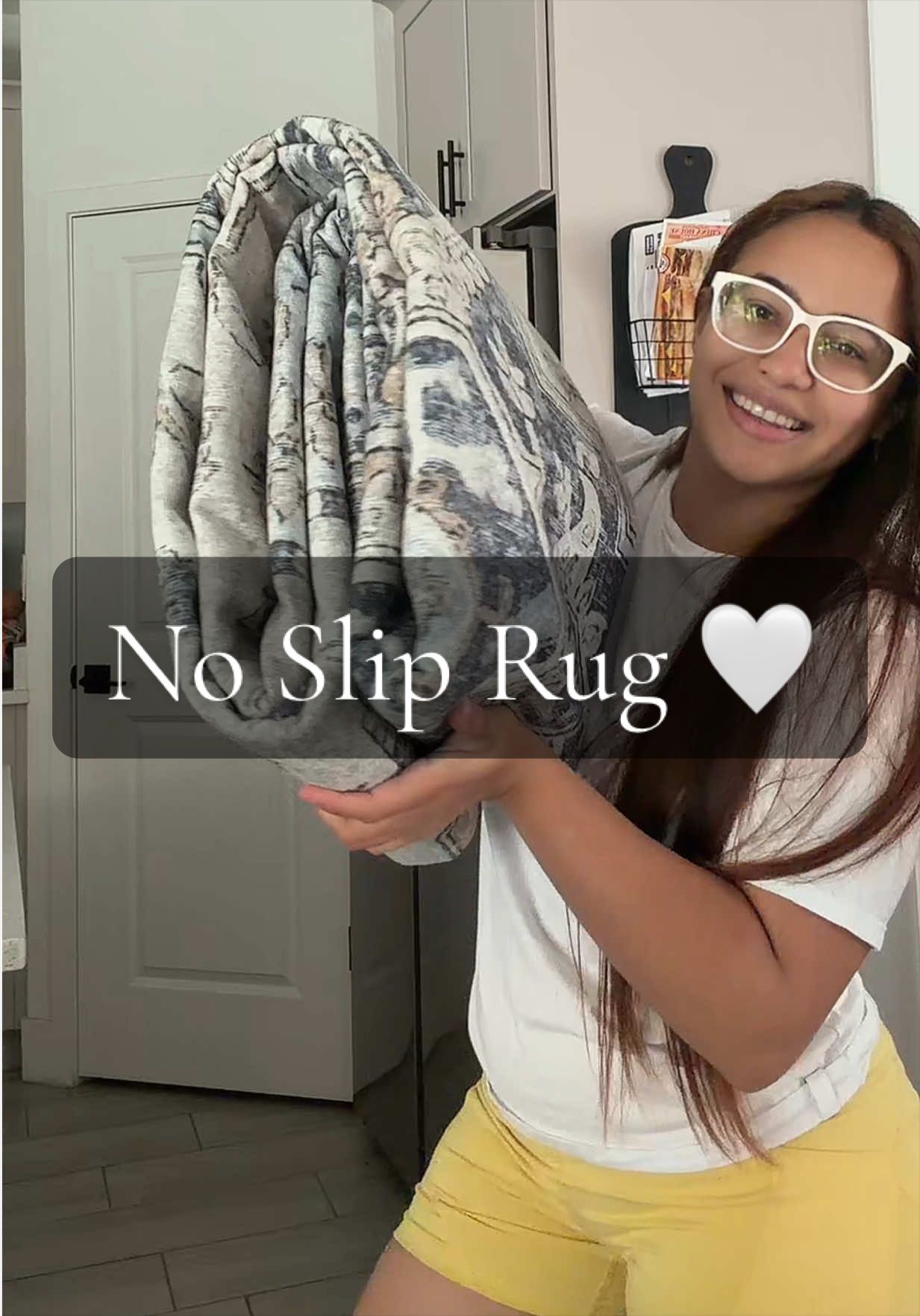 TikTok post by @itskathleenbabes for Genimo. Caption reads: [...] when do rugs actually stay in place 😭....