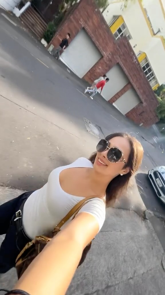 Instagram post by @katharina.weischede for AquaFlask. Caption reads: [...] of Auckland 🤍 Get 30% off your Aquaflask....