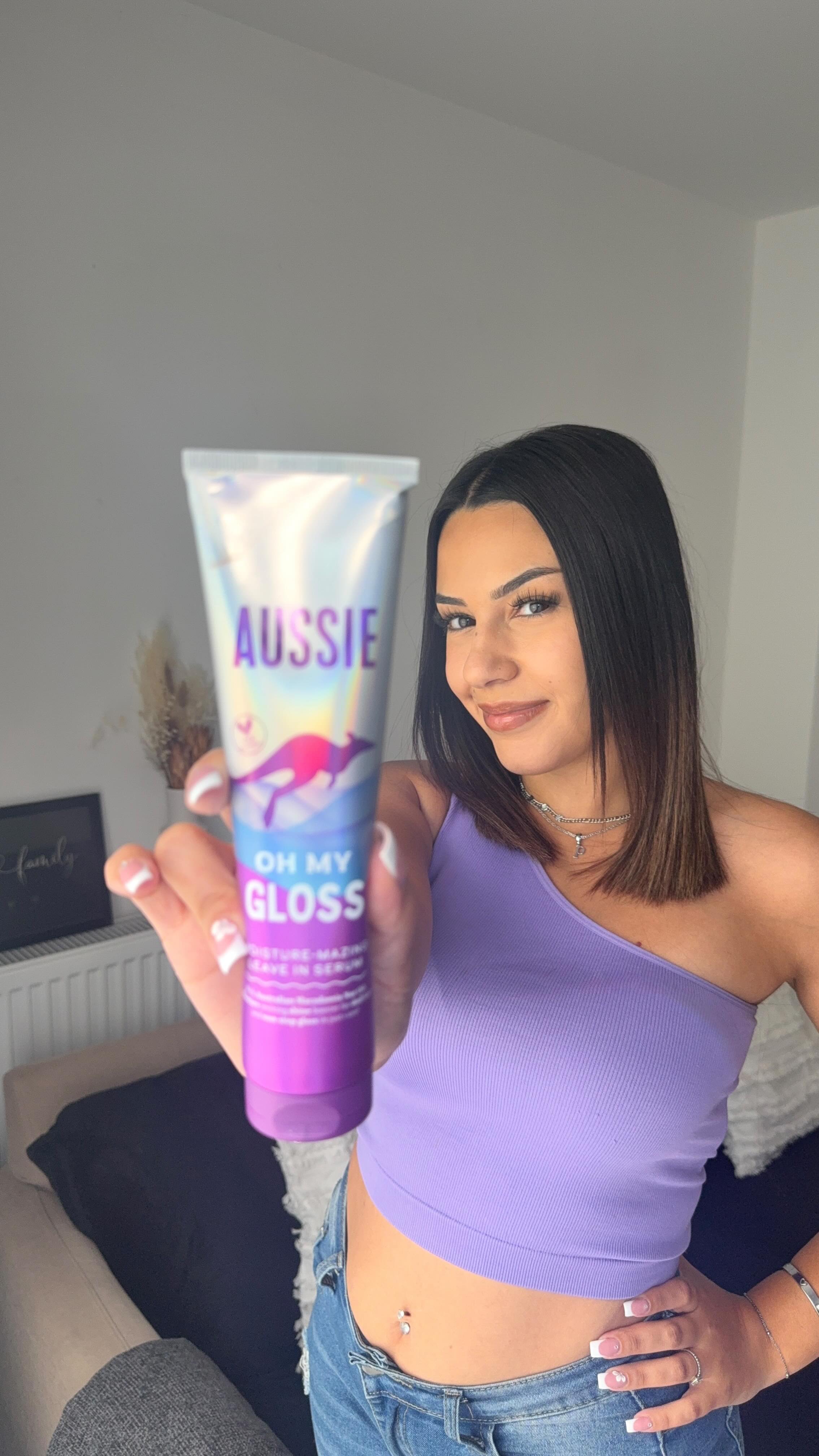 Instagram post by @margaridaax for SuperSavvyMe. Caption reads: Instant gloss & hydration with the NEW @aussiehair....