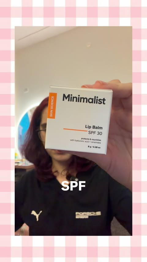 Instagram post by @ishikasbookofrecords for Minimalist. Caption reads: [...] Product link - #LipBalm #SPF #Ad....