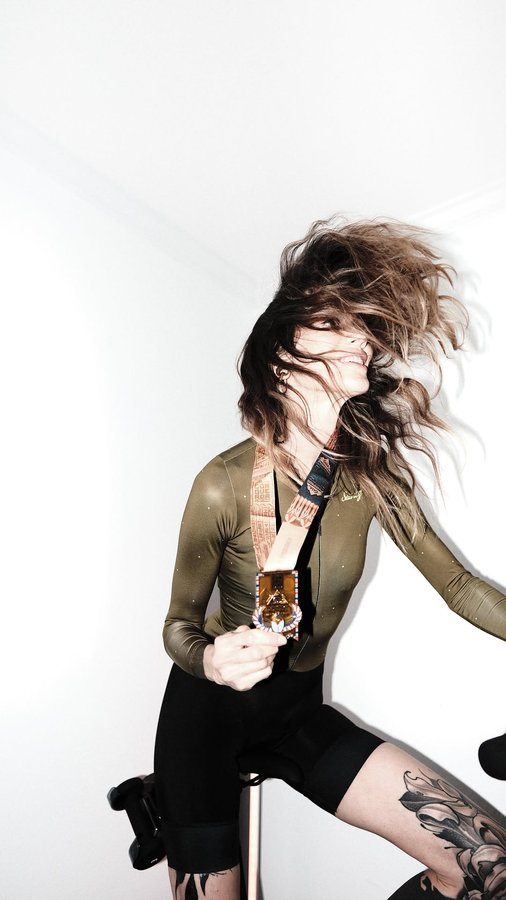 Instagram post by @erinohagainhealth for The Conqueror Virtual Challenges. Caption reads: Whether you bike, walk, run, swim, or spin....