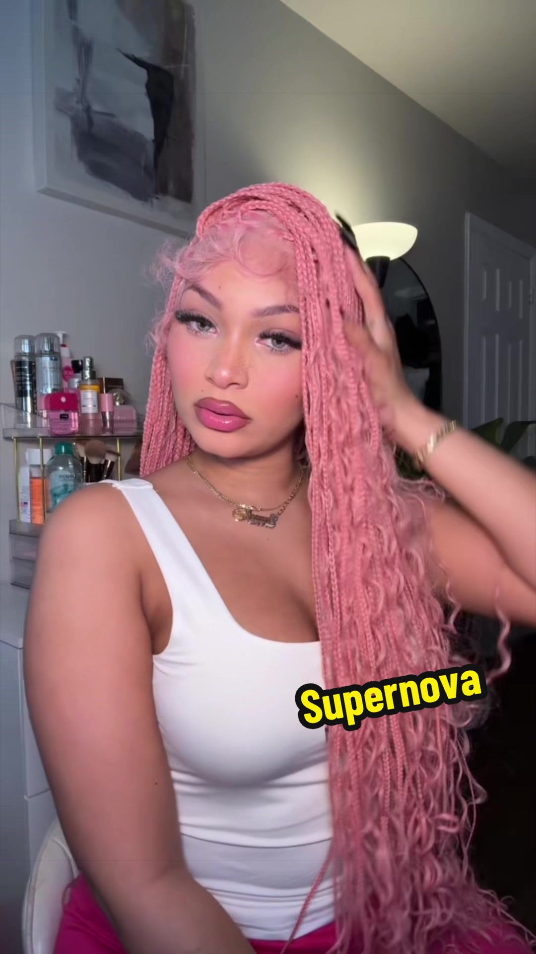 TikTok post by @simply.damnel for Supernova Hair. Caption reads: @Supernovahair al fin tengo mi peluquis rosadaaa.