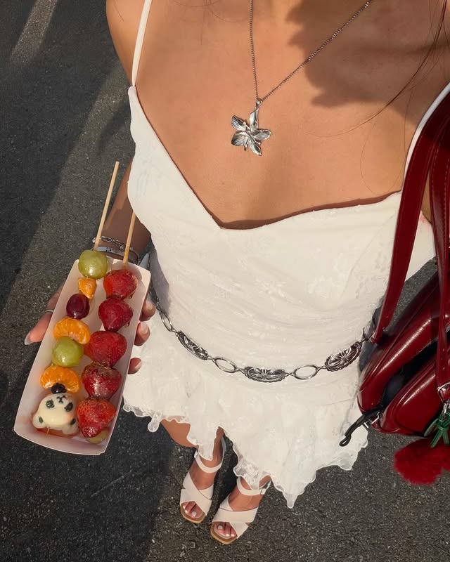 Instagram post by @emilie.cam for BEARPAW. Caption reads: [...] at a food festival is no joke 🍓🍊🍰....