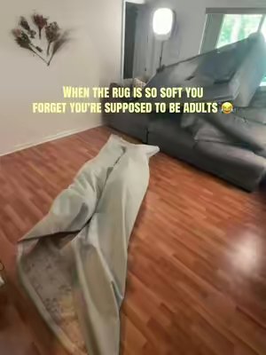 TikTok post by @natalienewdayofficial for MontVoo Rugs. Caption reads: @MontVoo Rugs gave me and hubby an excuse to play....