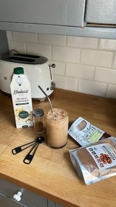 Instagram post by @megansheley for Elmhurst 1925. Caption reads: CHAGACCINO - you know, those trendy drinks you can....