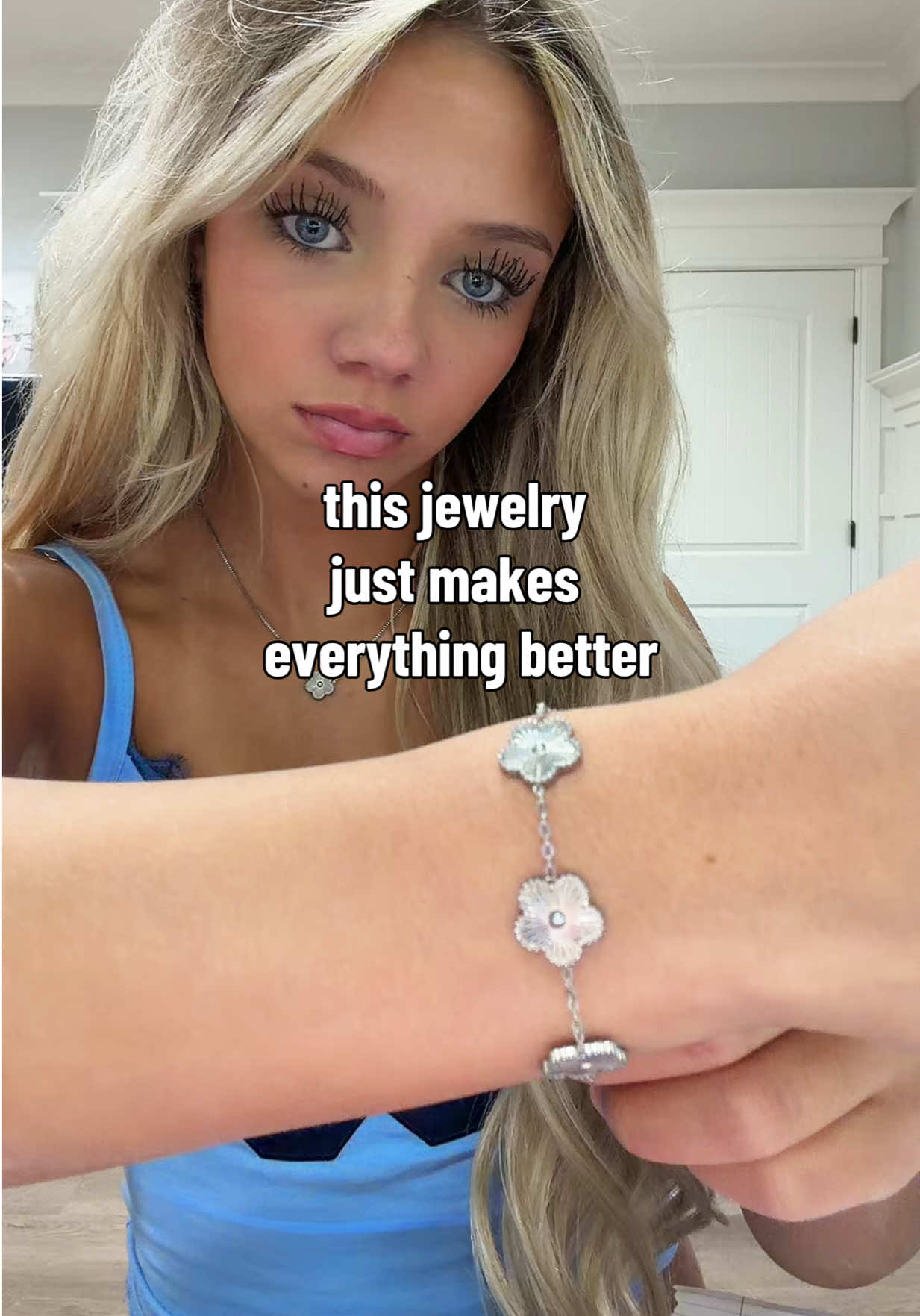 TikTok post by @belle_fits for EVRY JEWELS. Caption reads: run to @EvryJewels and use my code: BELLE77 [...].