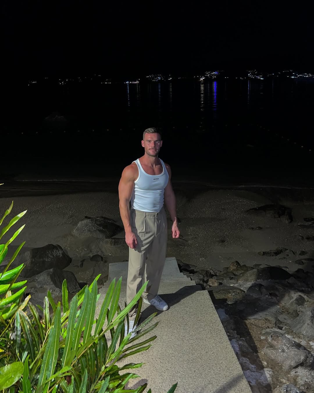 Instagram post by @imstevenhodgson for The Gay Passport. Caption reads: Island life suits me just....