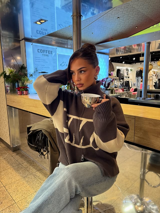 Instagram post by @estellakr for EME STUDIOS. Caption reads: Ad/ It’s the zipper for me🤎@emestudios_.